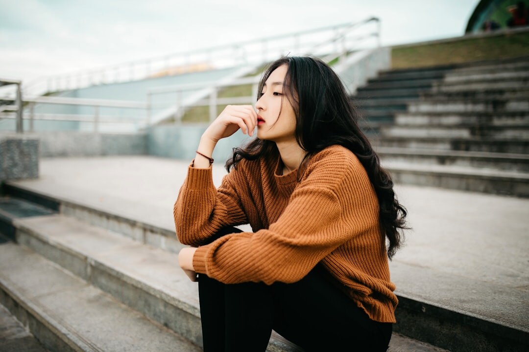 person thinking alone